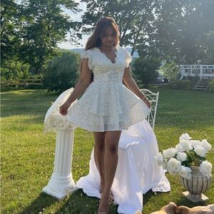 White Mini Fit and Flare Sundress with Flutter Sleeves and V-Neck